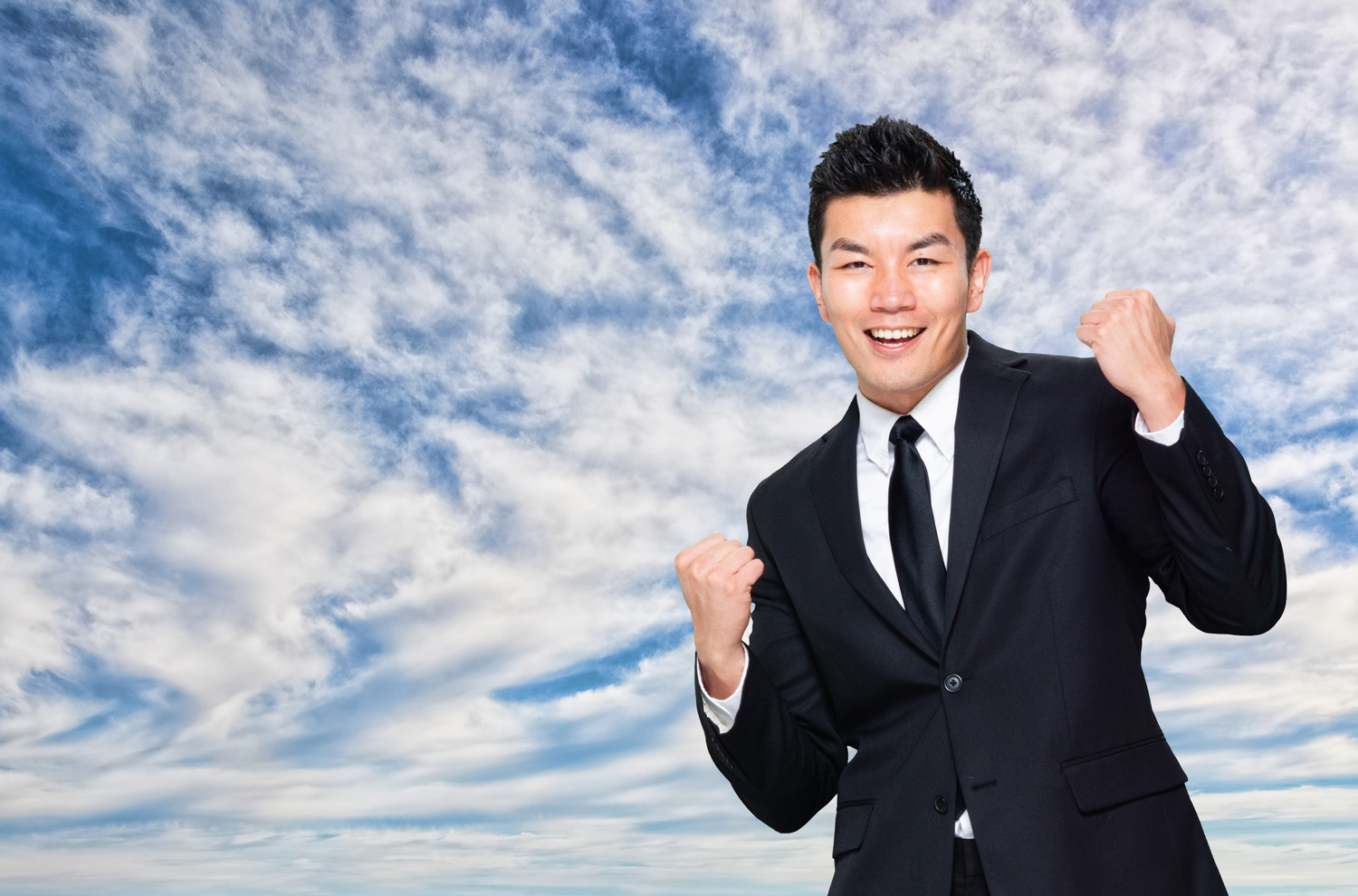 Asian / Chinese businessman - doing the fist pump